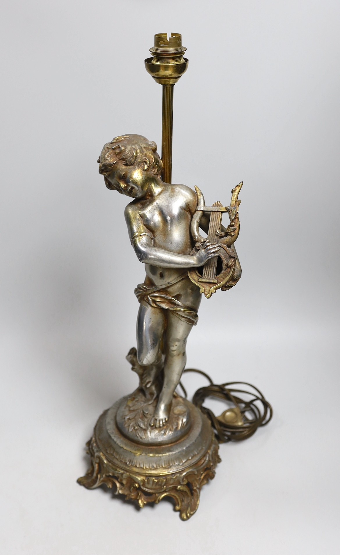 An Auguste Moreau silvered and gilded spelter figural putti musician table lamp, signed. 45cm tall